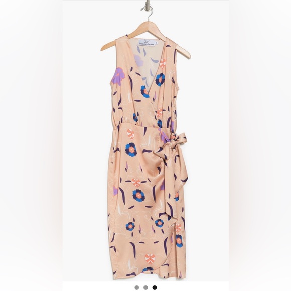 floral print elevates a sleeveless midi dress fashioned in a wrap silhouette - Picture 3 of 3